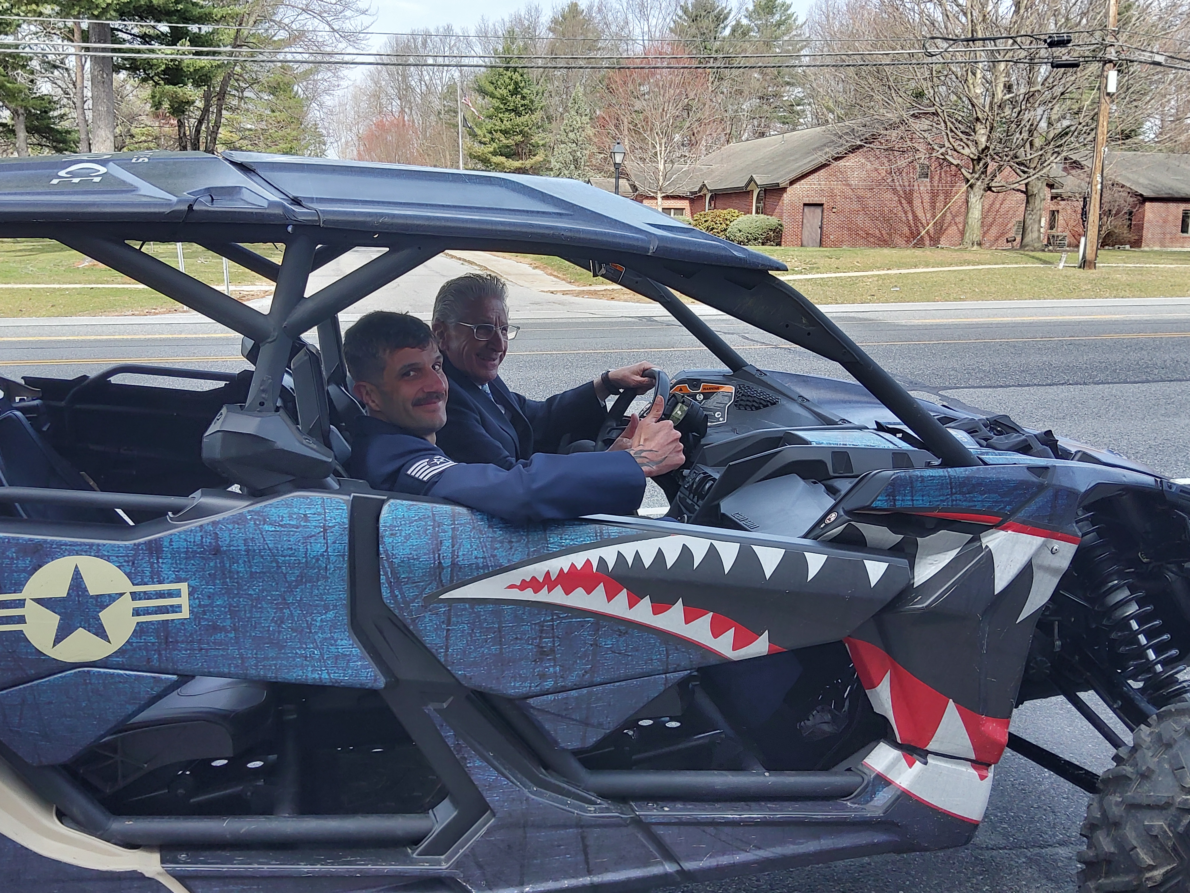 Senator Jim Tedisco sits in the driver's seat of a US Air Force vehicle with Technical Sergeant Jonathan Davis, who is in charge of the new Malta office. (Melissa Schuman - MediaNews Group)