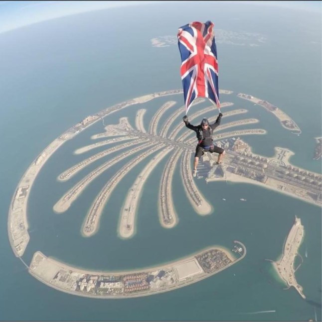 Chas McNeil skydiving with the Union Jack flag.