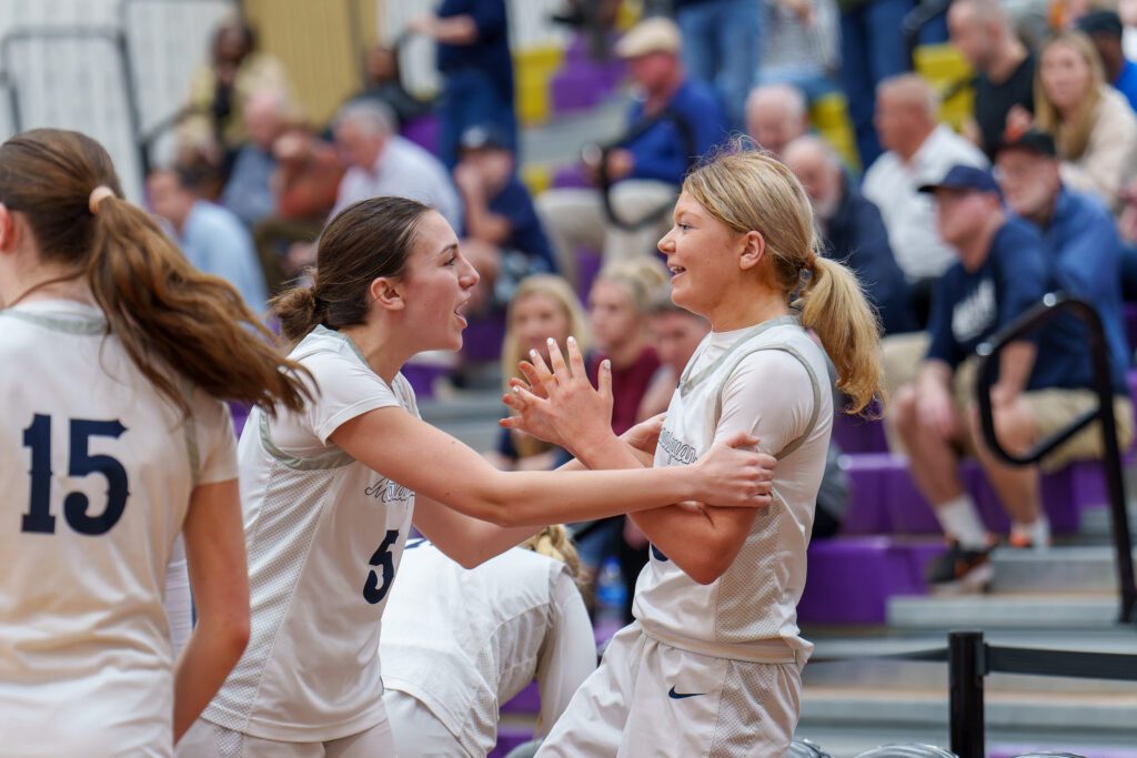 Paige Donnelly (Left) celebrating with Shannon Looney (right) after Looney put Manasquan up 33-31 in the 4th quarter. 3/10/26  Photo by Patrick Olivero - Looney