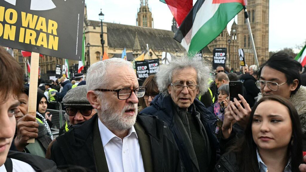 Jeremy Corbyn joins hundreds of pro-Iran protesters in London carrying banners of the Ayatollah