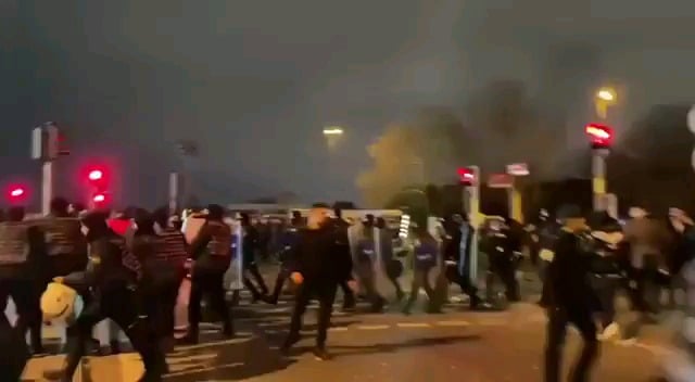 As soon as the rally ends, the police attack the people...
