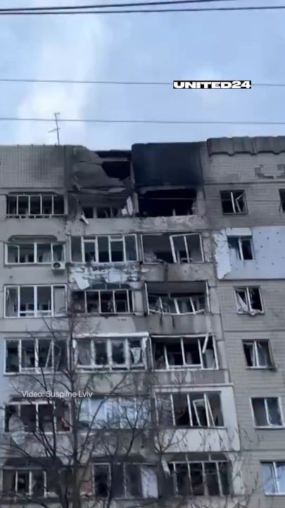 Man raises Ukrainian flag moments after Russian drone strikes his home during today's attack on Lviv