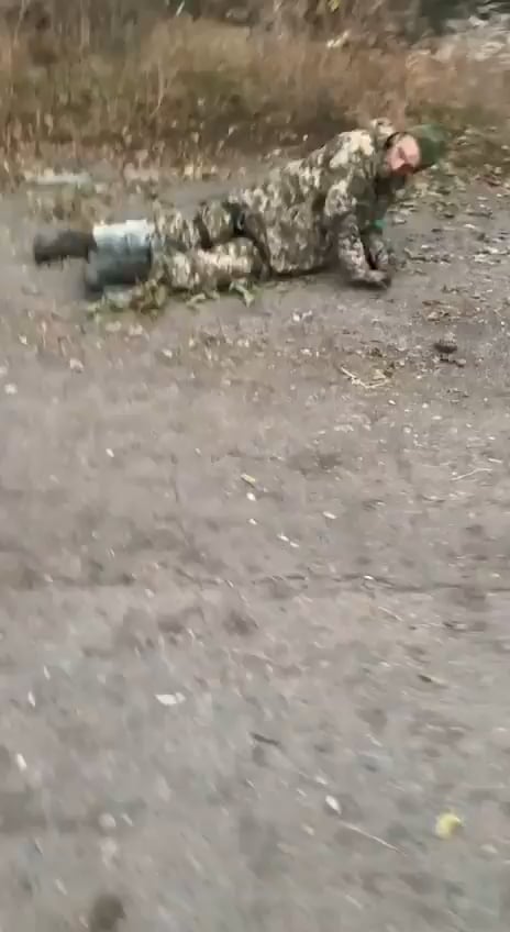Wounded Ukrainian Soldier executed point-blank by the russians.

Footage shows a wounded, unarmed Ukrainian soldier (reportedly from Sumy region) identifying himself before being shot at close range by russian troops.