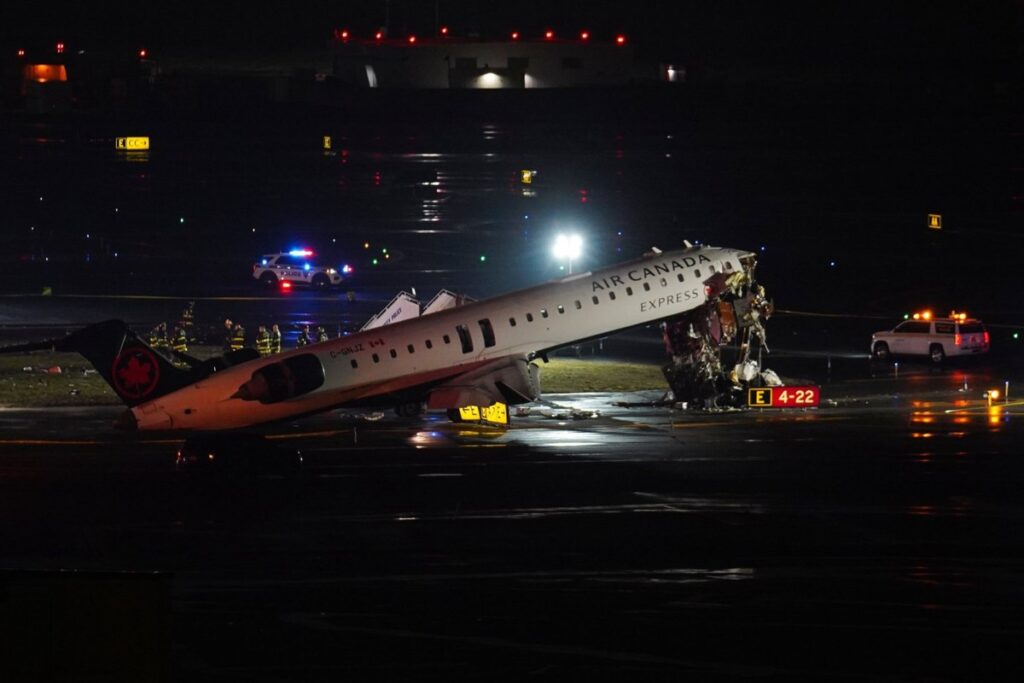 Air Canada flight collides with a Port Authority vehicle at New York’s LaGuardia Airport Air Canada flight collides with a Port Authority vehicle at New York's LaGuardia Airport