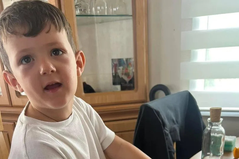 Harry writing his message