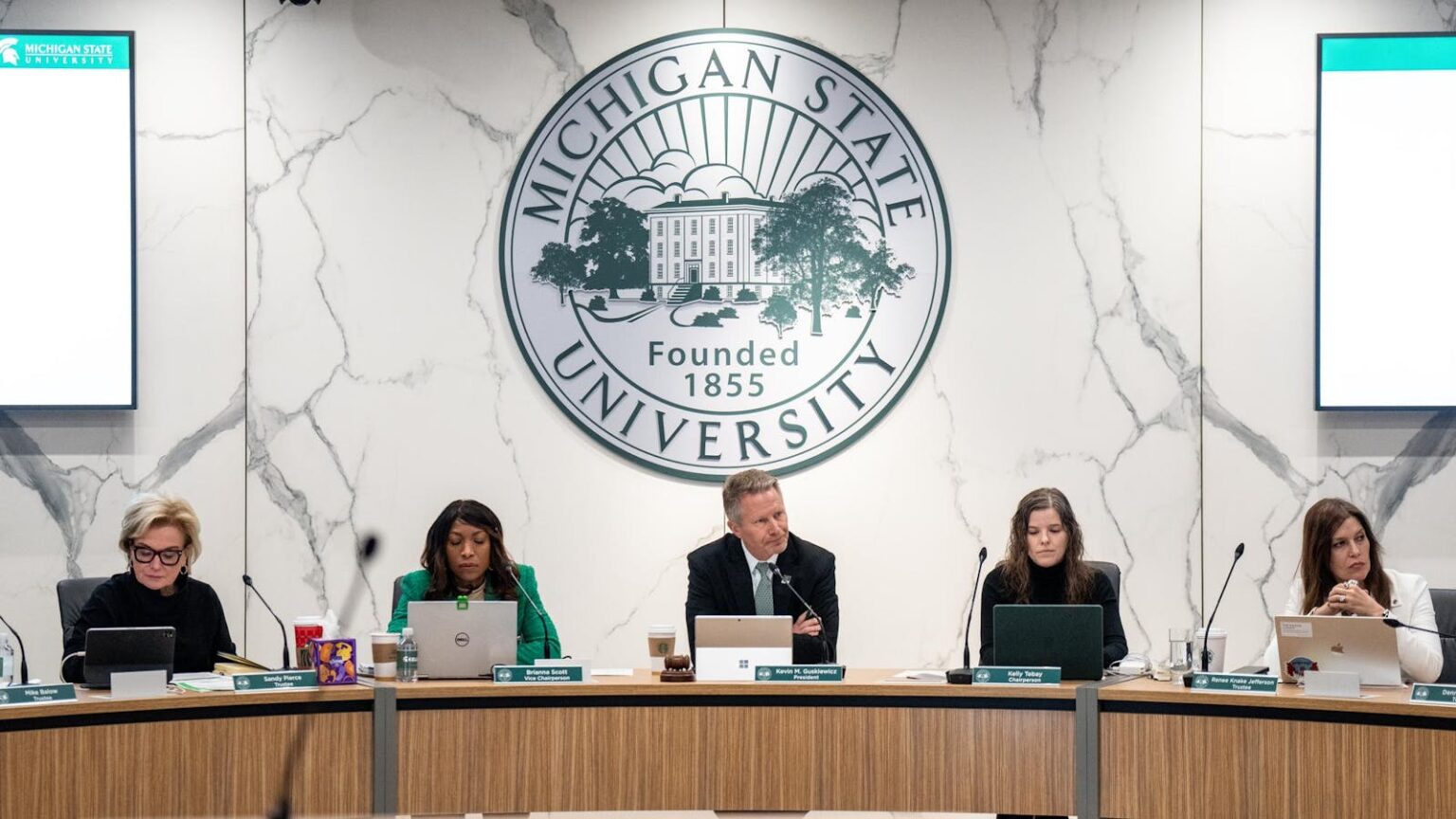 Free travel, occasional seats to MSU sports a perk for unpaid trustees