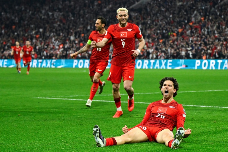 Kadioglu fires Turkey past Romania, to brink of World Cup