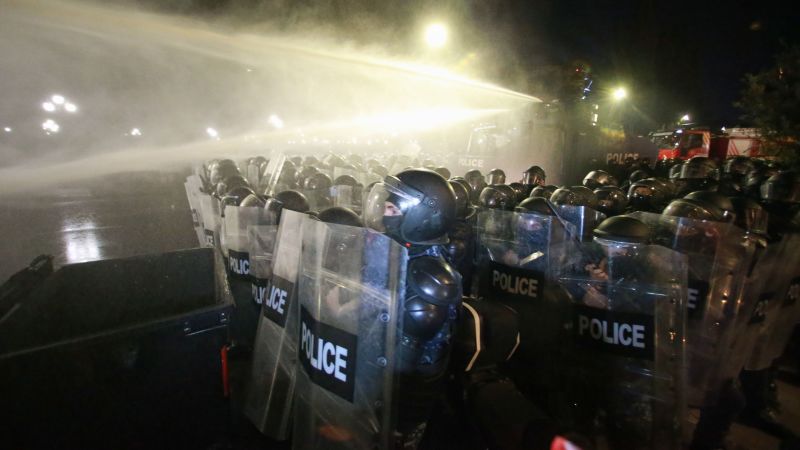 Georgia’s police use water cannons to push back protesters trying to storm presidential palace