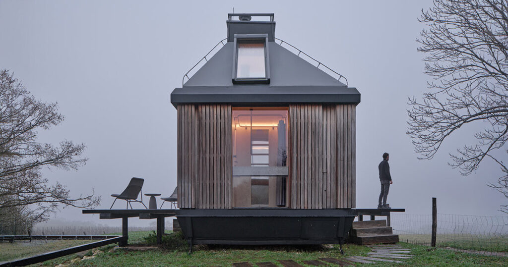 ark-shelter & archekta craft off-grid cabin with a fold-down facade in devín, slovakia ark-shelter & archekta craft off-grid cabin with a fold-down facade in devín, slovakia