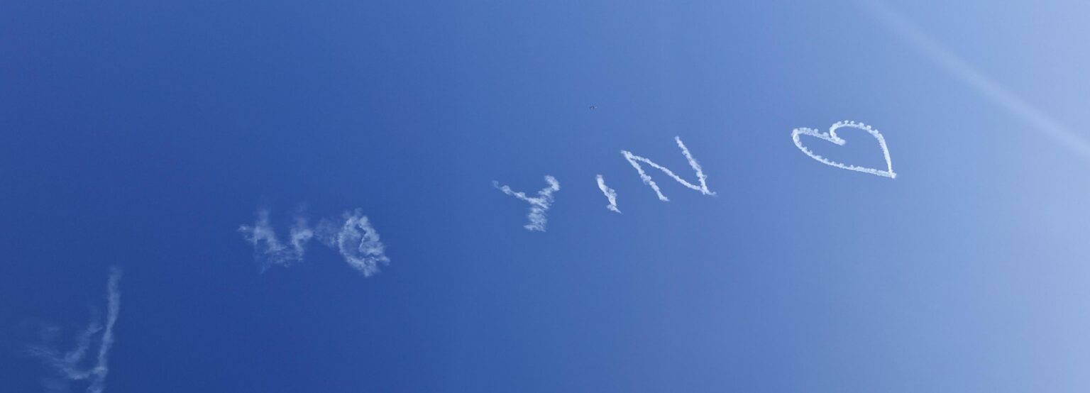 Our sky writing buddy made a spelling error in the proposal and came back to fix it. Congratulations Yin, sorry Lin
