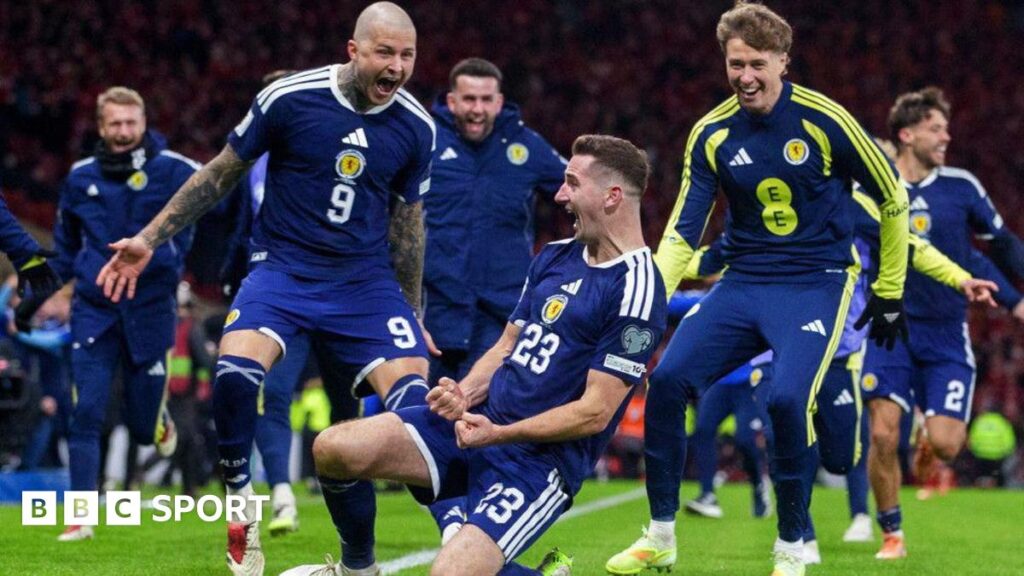 The Scotland team celebrate Kenny McLean's (centre) goal to make it 4-2 during a FIFA World Cup 2026 Qualifier between Scotland and Denmark at Hampden Park, on November 18, 2025, in Glasgow, Scotland