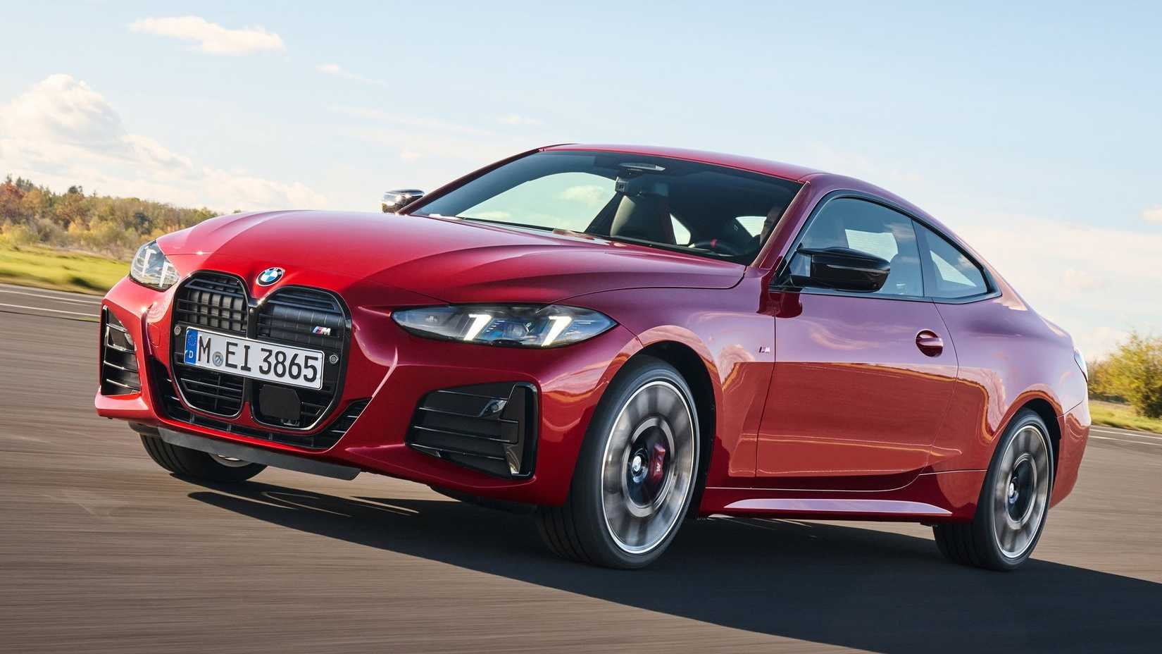 BMW M440i dynamic handling accelerating front third quarter view