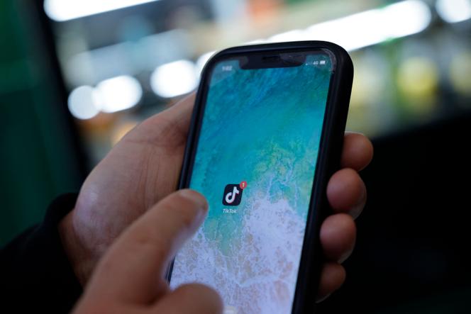 A user opens the TikTok app in Durrës, Albania, on February 5, 2026. Alongside ChatGPT, Wikipedia, and X, TikTok is one of the main vectors for disinformation campaigns targeting democracies.