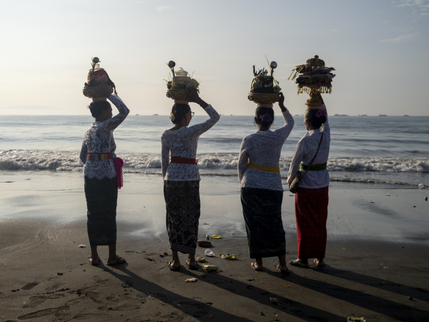 Balinese women standing on a beach