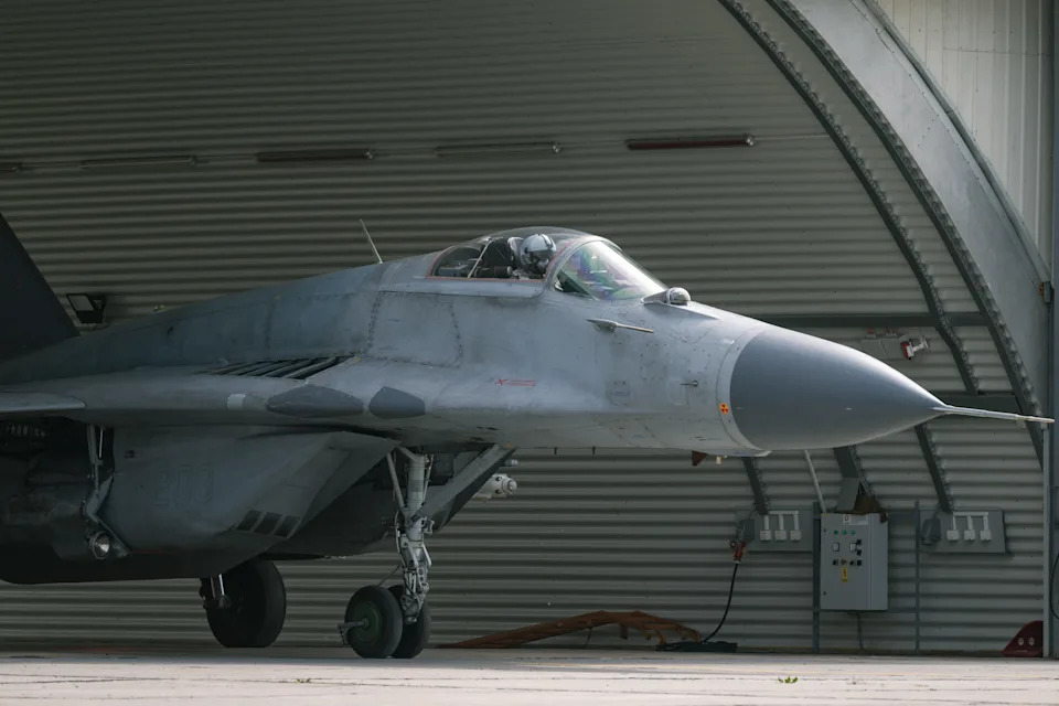 A pilot of the standby unit of the fighter aviation gets ready for take-off aboard a Mikoyan MiG-29 twin-engine fighter aircraft during a military excercise at the "Colonel-Pilot Milenko Pavlovic" military airport in Batajnica on March 31, 2024. The President of the Republic and the Supreme Commander of the Serbian Armed Forces, Aleksandar Vucic, visited on March 31, 2024 the standby unit of the fighter aviation for the control and protection of the airspace of the Republic of Serbia, at the "Colonel-Pilot Milenko Pavlovic" military airport in Batajnica. (Photo by Andrej ISAKOVIC / AFP) (Photo by ANDREJ ISAKOVIC/AFP via Getty Images)