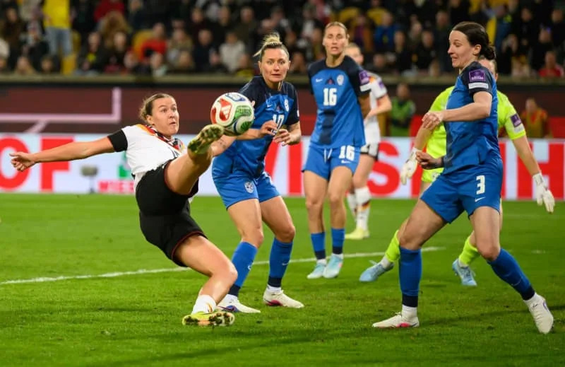 Germany's Larissa Muehlhaus scores her side's fourth goal during the 2027 FIFA Women's World Cup qualifier League A, Group D, soccer match between Germany and Slovenia at the Rudolf-Harbig-Stadion Robert Michael/dpa
