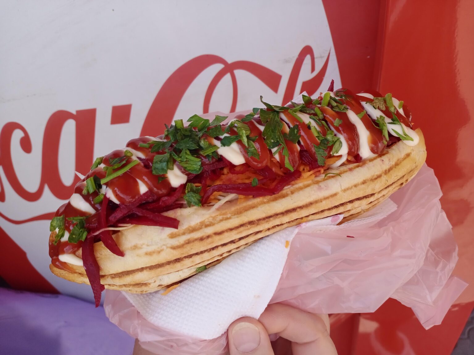 Sometimes, when I'm allowed to visit my hometown (Voznesensk, the Mykolaiv region) for a day, as a break from my military service, I go to an open market to a hotdog stall where they make those hotdogs like they did in 90's here in Ukraine