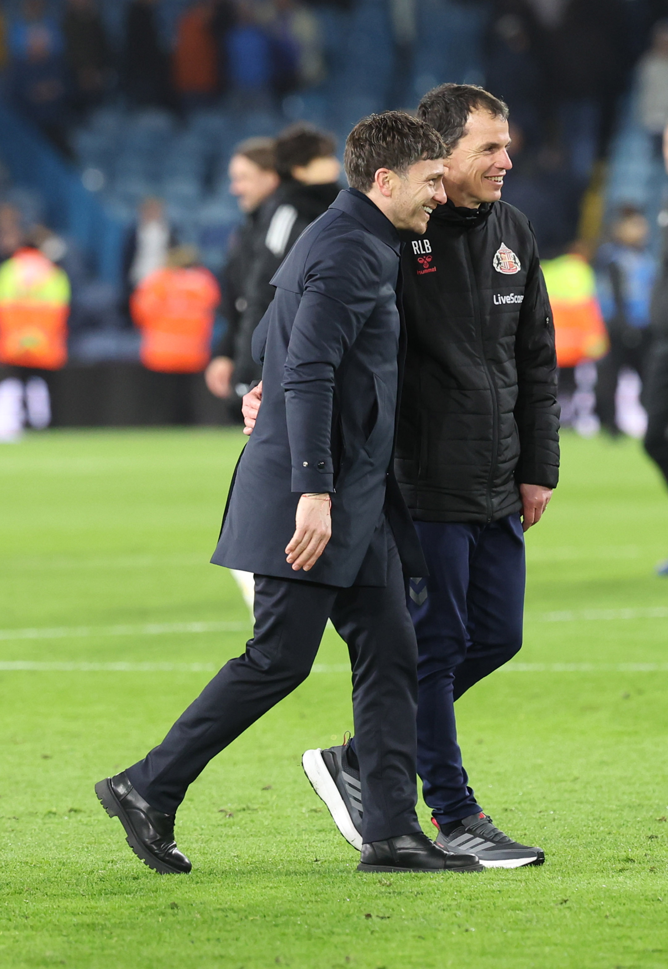 LEEDS, ENGLAND - MARCH 3: Sunderland director of football Florent Ghisolfi and head coach Régis Le Bris celebrate reaching forty points on the final whistle during the Premier League match between Leeds United and Sunderland at Elland Road on March 3, 2026 in Leeds, United Kingdom. (Photo by Ian Horrocks/Sunderland AFC via Getty Images)