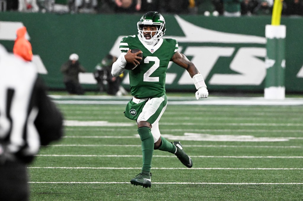 Jets quarterback Tyrod Taylor (2) runs for a first down during the fourth quarter of the Jets and Atlanta Falcons game in East Rutherford, NJ on November 30, 2025. 