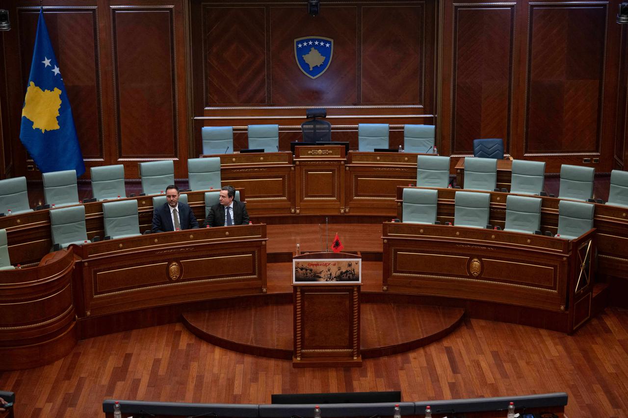 Kosovo Prime Minister Albin Kurti (R) flanked by presidential nominee Glauk Konjufca attends a parliamentary session in Pristina on March 5, 2026, as members of Parliament fail to elect a new president. (AFP Photo)