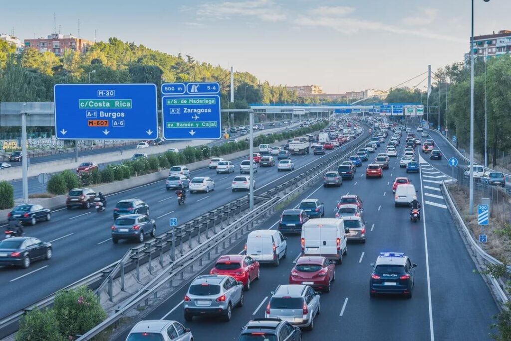 If one day you were to go to Madrid by car, what would be your plan to avoid getting stuck in a traffic jam?