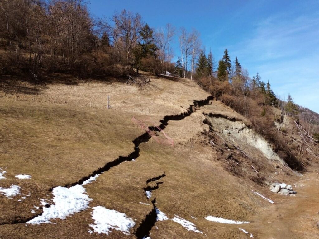 Swiss mountainside fault grows as evacuation plans prepared