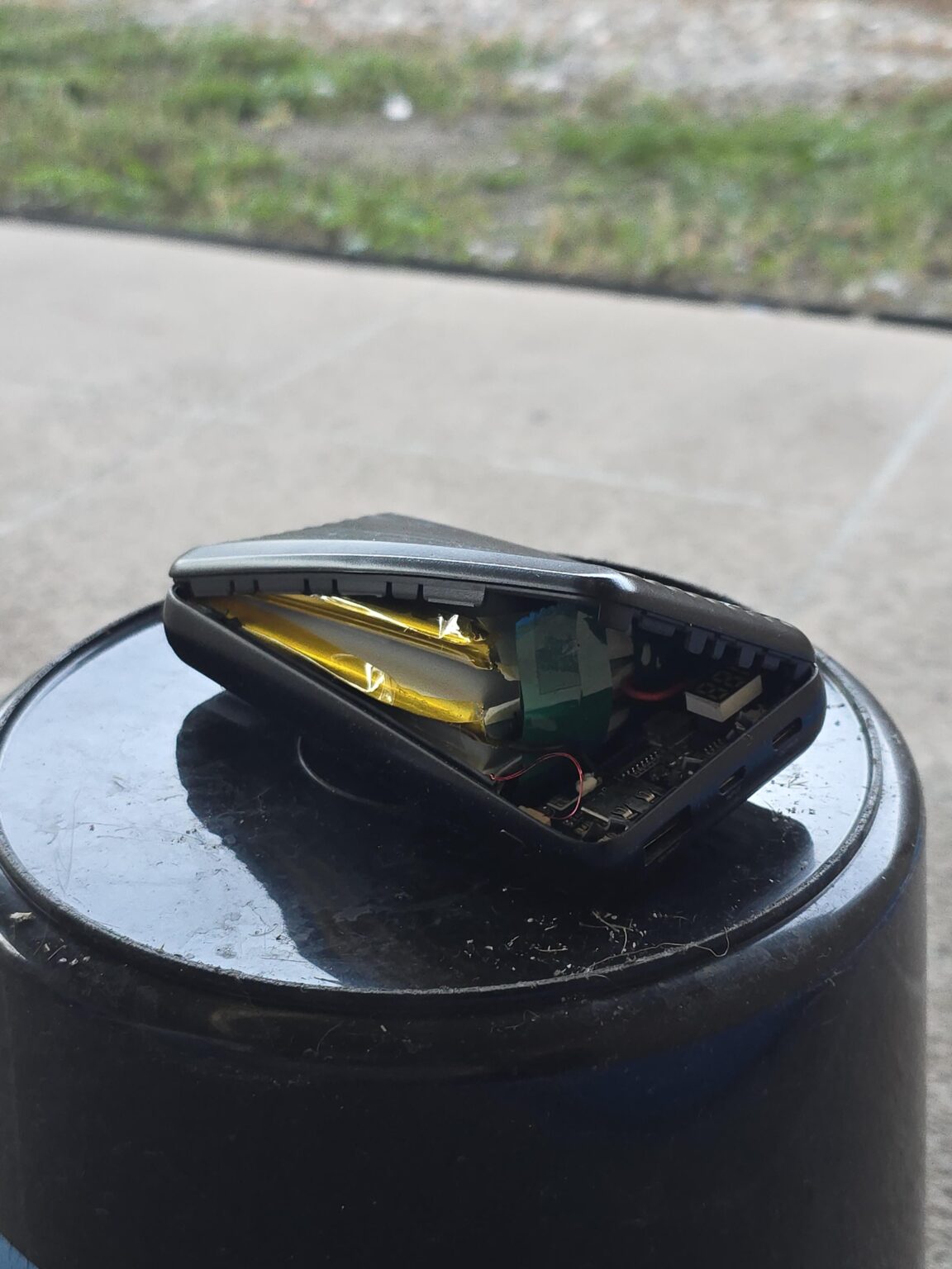 where do I dispose of an inflated power bank in Logan? I'm scared to move it