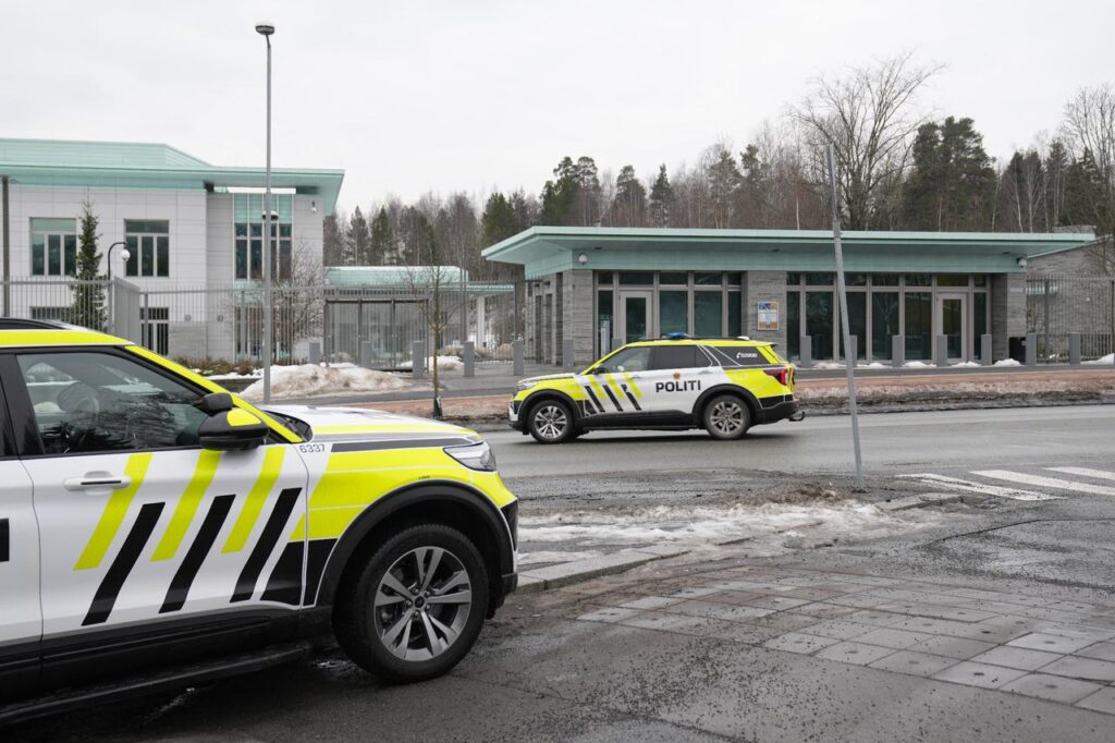 Police cars stand in front of the US Embassy in Oslo, Norway, on March 8, 2026, hours after a loud bang was reported at the site. (AFP Photo)