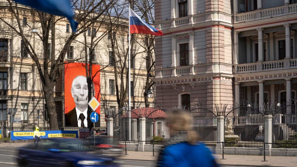 Russian diplomat handed another protest note by Latvia / Article Kriša Salmaņa veidots plakāts pie Medicīnas vēstures muzeja fasādes iepretī Krievijas vēstniecībai R...