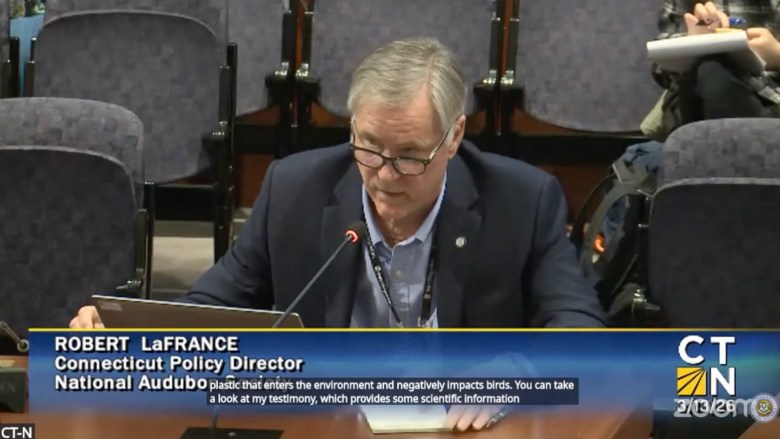 Man speaks into micriphone