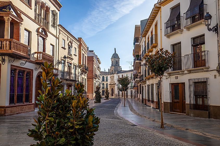 Calle del Río with stately houses and the Parish of Virgen del Carmen in Priego de Córdoba, Andalusia, Spain