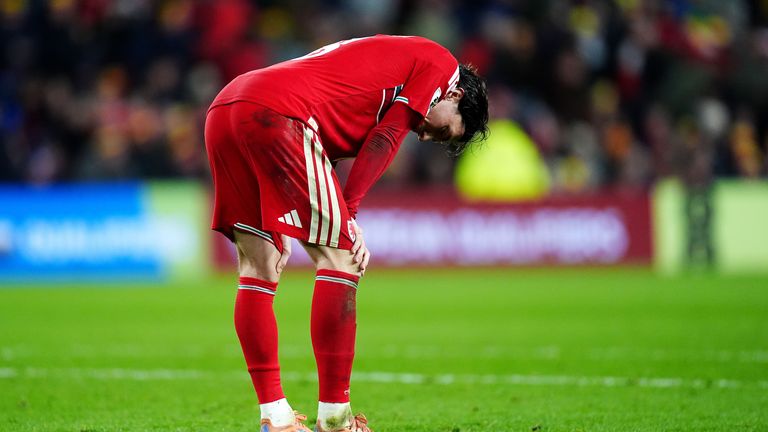 Wales' Harry Wilson reacts after extra-time 