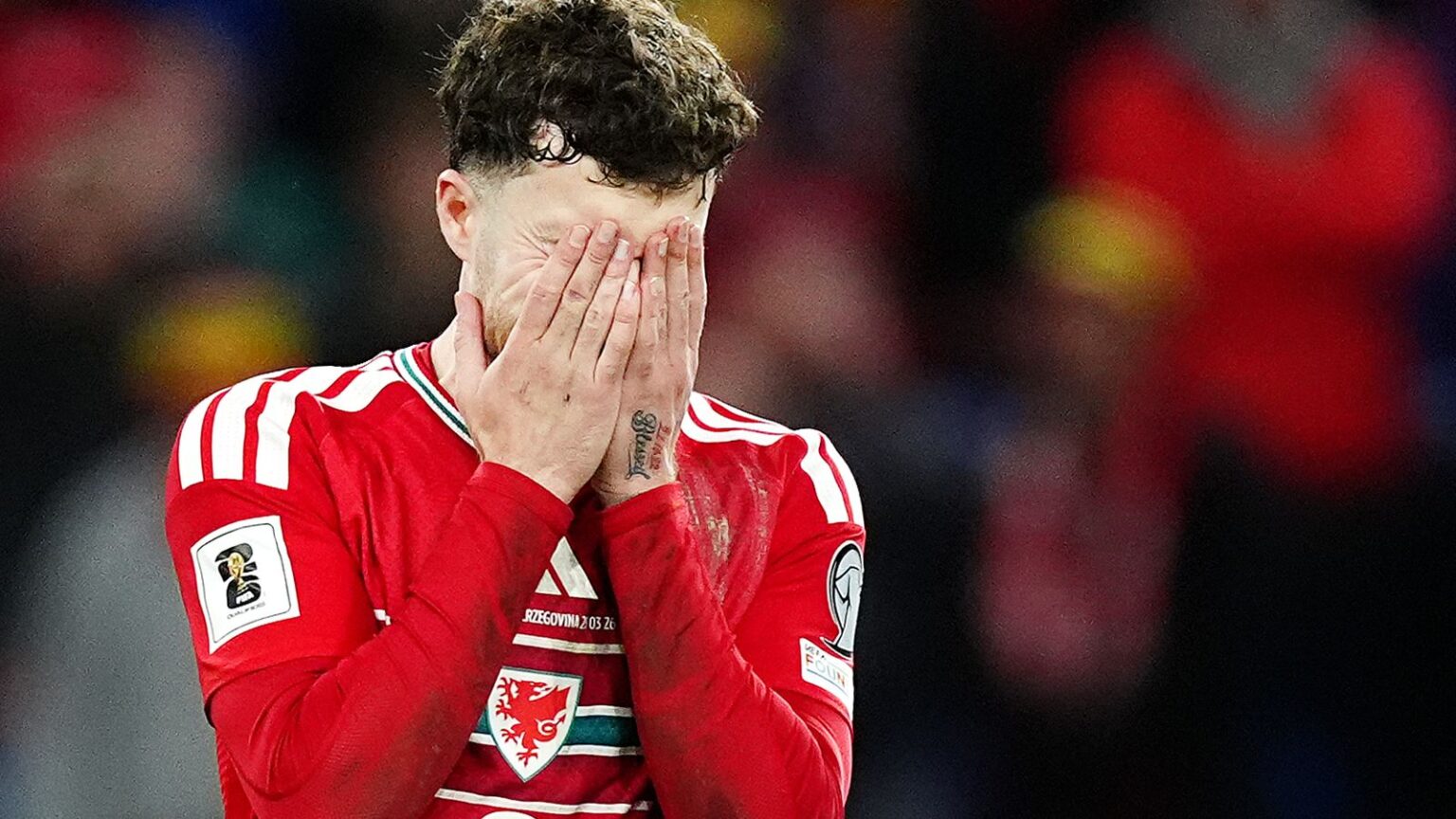 Wales' Neco Williams reacts after missing his penalty in the shoot-out