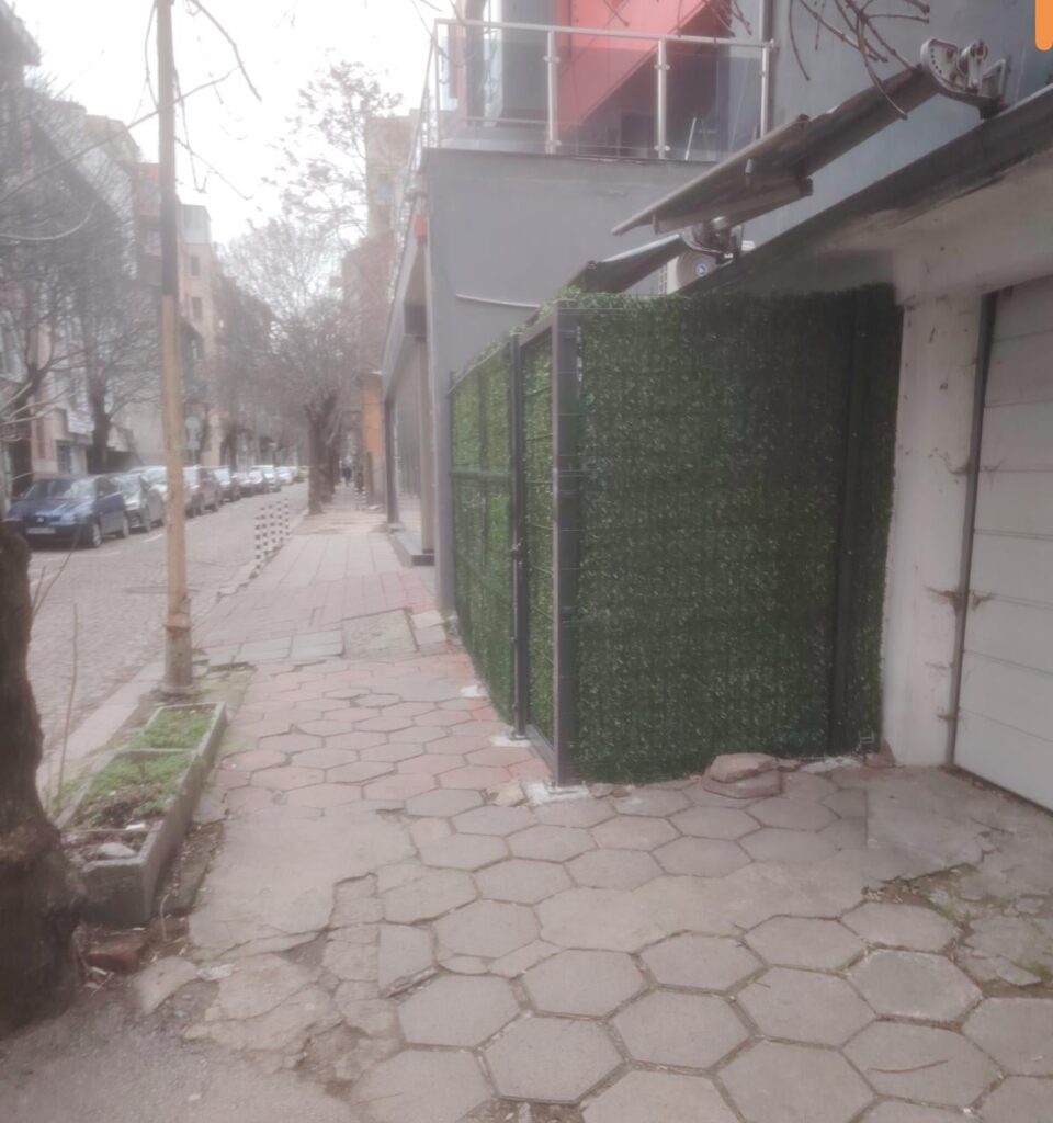 You live in a garage, but your sidewalk is a garden