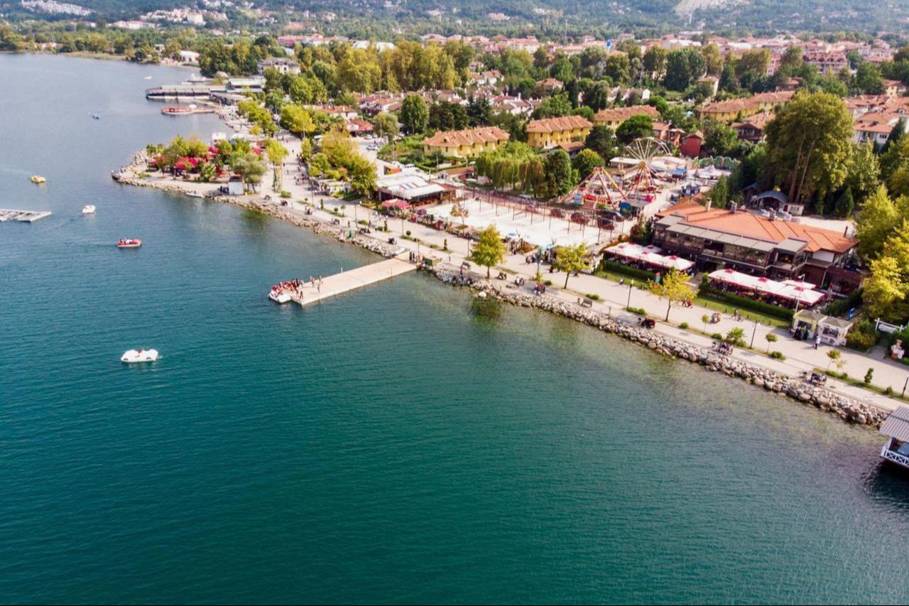 Sapanca Lake in Sakarya, Türkiye seaside with Pedalo. (Adobe Stock Photo)