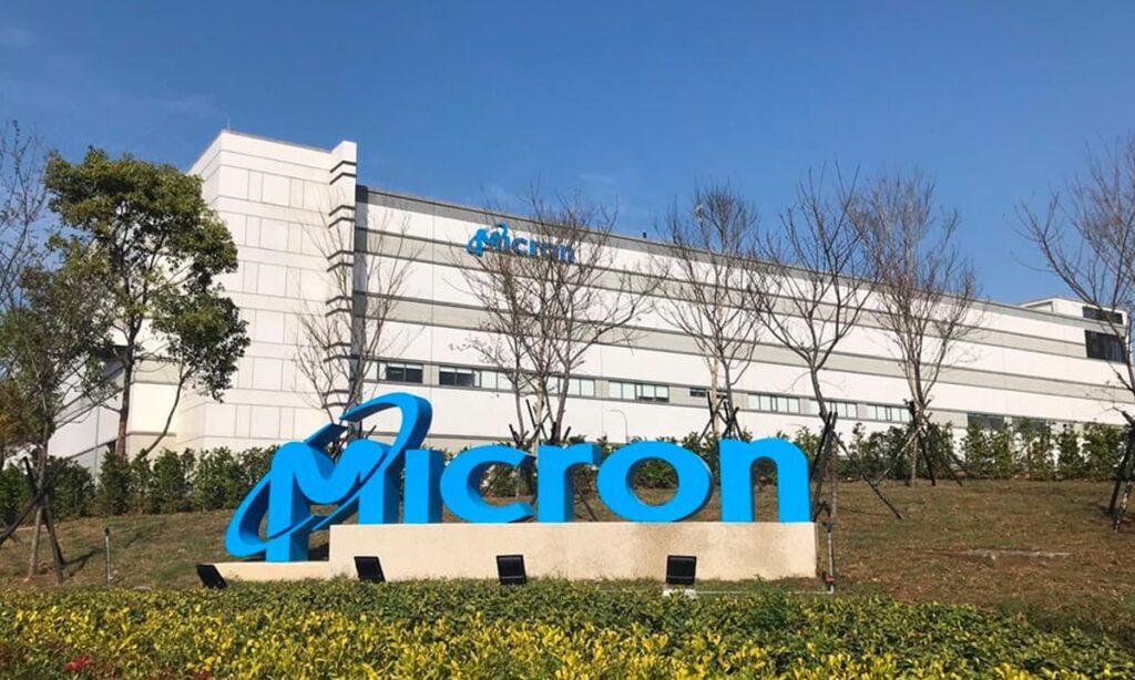 Micron Technology logo in front of a company building.