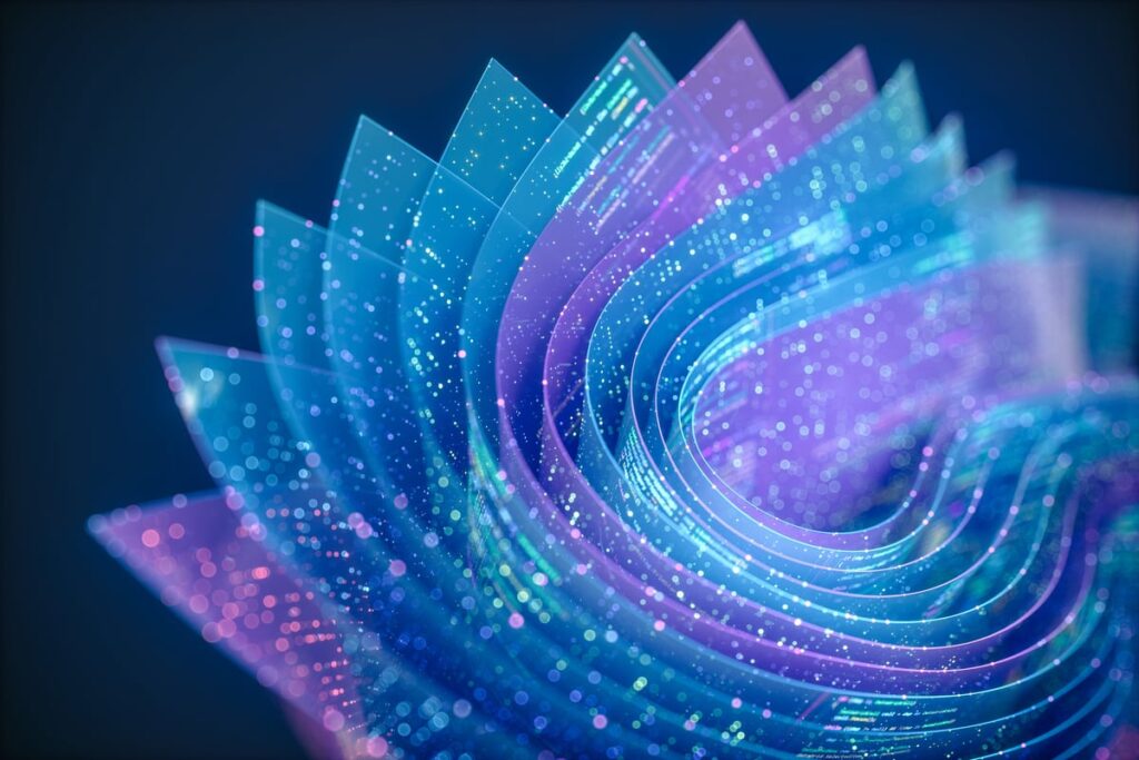 Oracle Isn’t Done Spending Big on AI. Here’s Why It Said Investors Shouldn’t Worry. Colorful layers of lines and code are folded into a three-dimensional shape.