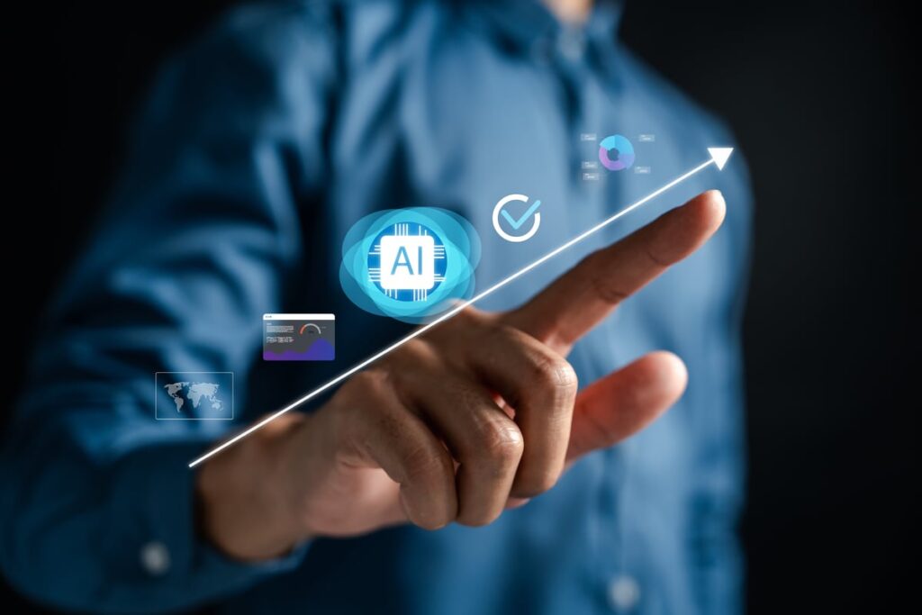 Prediction: This Artificial Intelligence (AI) Stock Will Be Worth $5 Trillion by the End of 2026 Person tracing an arrow moving up and to the right with various icons above it, including an AI chip.