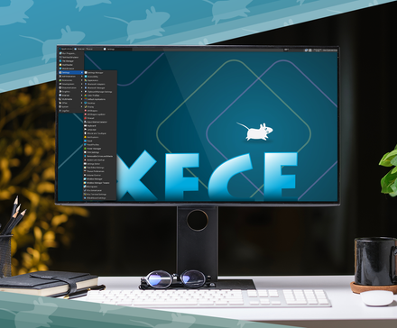 Desktop computer displaying the Xfce Linux desktop environment, set on a clean desk with a keyboard, mouse, mug, notebook, pens, sunglasses, and a potted plant.