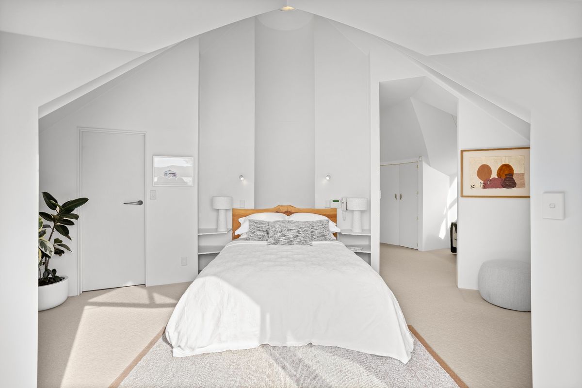 The principal bedroom occupies the turreted top of the tower at a House in New Zealand in the Bay of Islands for sale design based on Castell Coch and called Castell Bach with agent Mackys Real Estate part of Bayleys Realty Group for over $3m New Zealand dollars