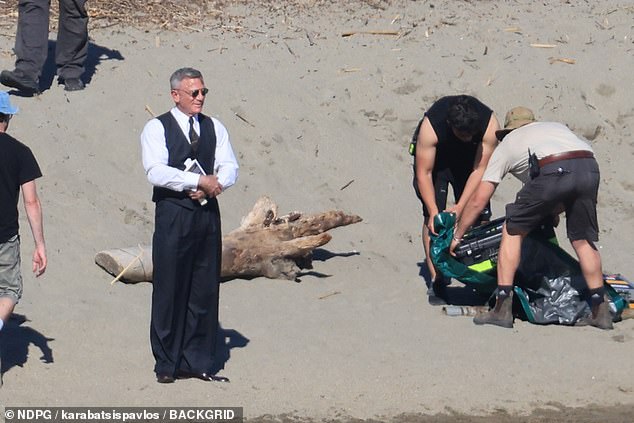 Extras were also seen carrying out manual labour along the shoreline, adding to the gritty atmosphere