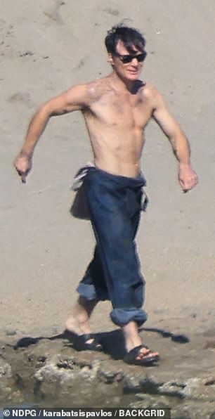 The Irish actor was seen jumping across rocks in the sea