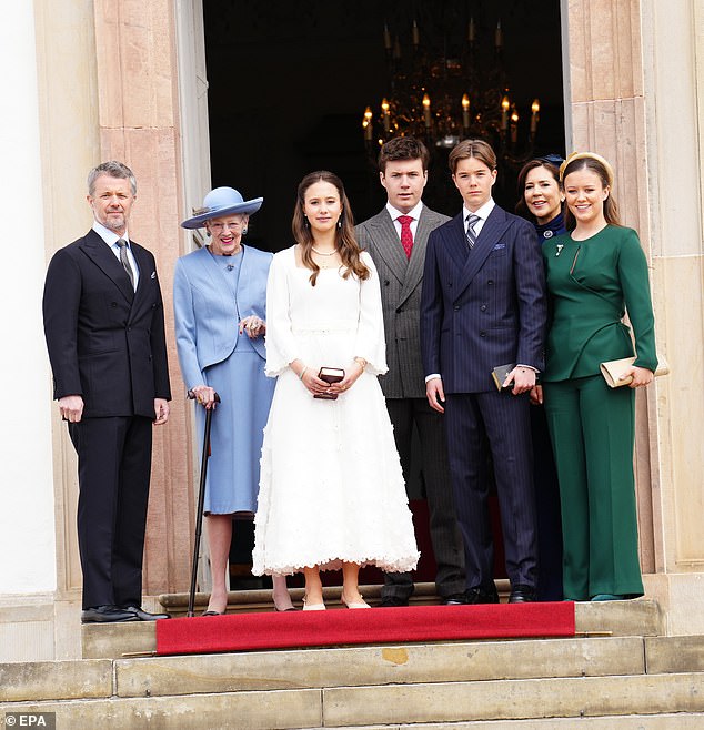 The royals stand outside Fredensborg Palace Church with Queen Margethe, second from left