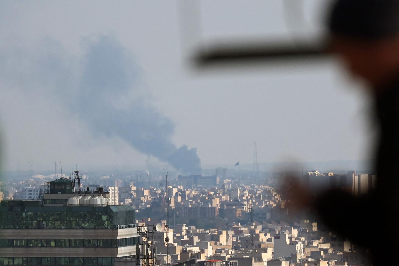 Smoke rises from the site of a strike in Tehran on April 1, 2026. (AFP Photo)