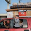 Displaced residents travel through the Qasmieh area as they gesture on the way back to their homes in the southern Lebanon, on Friday, after the start of a 10-day ceasefire deal struck between Lebanon and Israel. Despite the truce, the Israeli military and Hezbollah warned residents not to return to their villages for their own safety.
