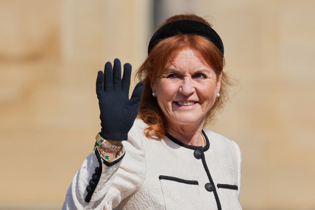 Sarah Ferguson smiles and waves at the camera