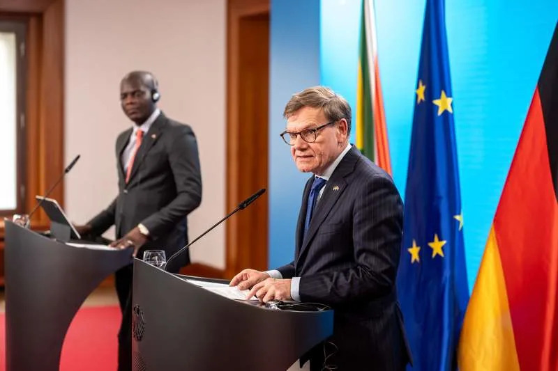 German Minister of Foreign Affairs Johann Wadephul (R) and his South African counterpart Ronald Ozzy Lamola speak during a press conference after the meeting of the Binational Commission. Michael Kappeler/dpa