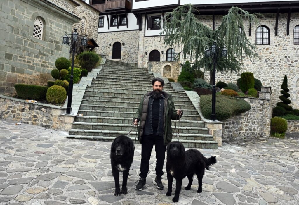 Ilija Karov, president of the Kennel Club for the Macedonian shepherd dog Karaman, walks Karaman dogs at the Bigorski Monastery in Mavrovo i Rostuse.
