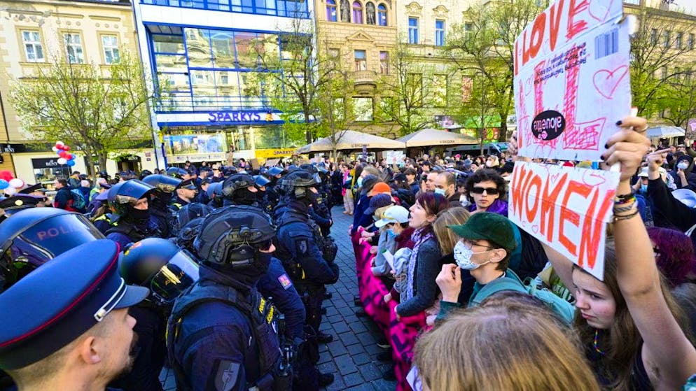 Police officers stand against protesters at the March for Life event on HradcanskÈ Square. Photo: ∑im-nek VÌt/CTK/dpa