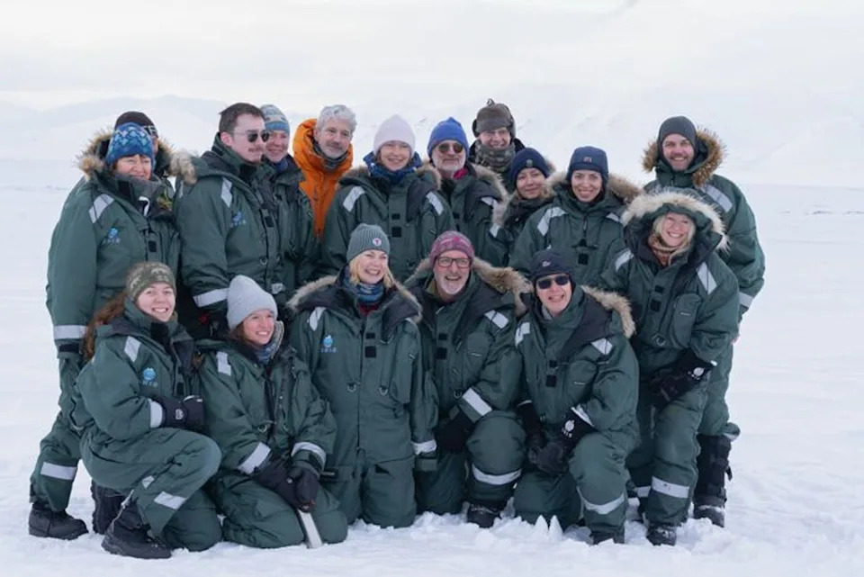 Norway's research minister Sigrun Gjerløw Aasland (front row, centre) poses with climate scientists in Svalbard (Anja Hansen)